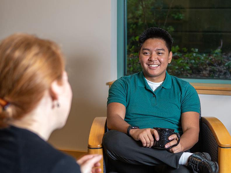 An SPU student meets with a mentor | photo by Lynn Anselmi